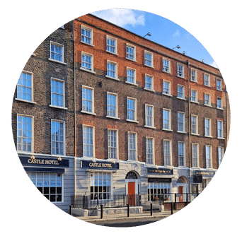 Georgian Buildings of Castle Hotel with signage for Old Music Shop with doors