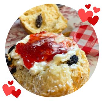 freshly baked fruit scone with cream and strawberry jam at Old Music Shop Restaurant Dublin