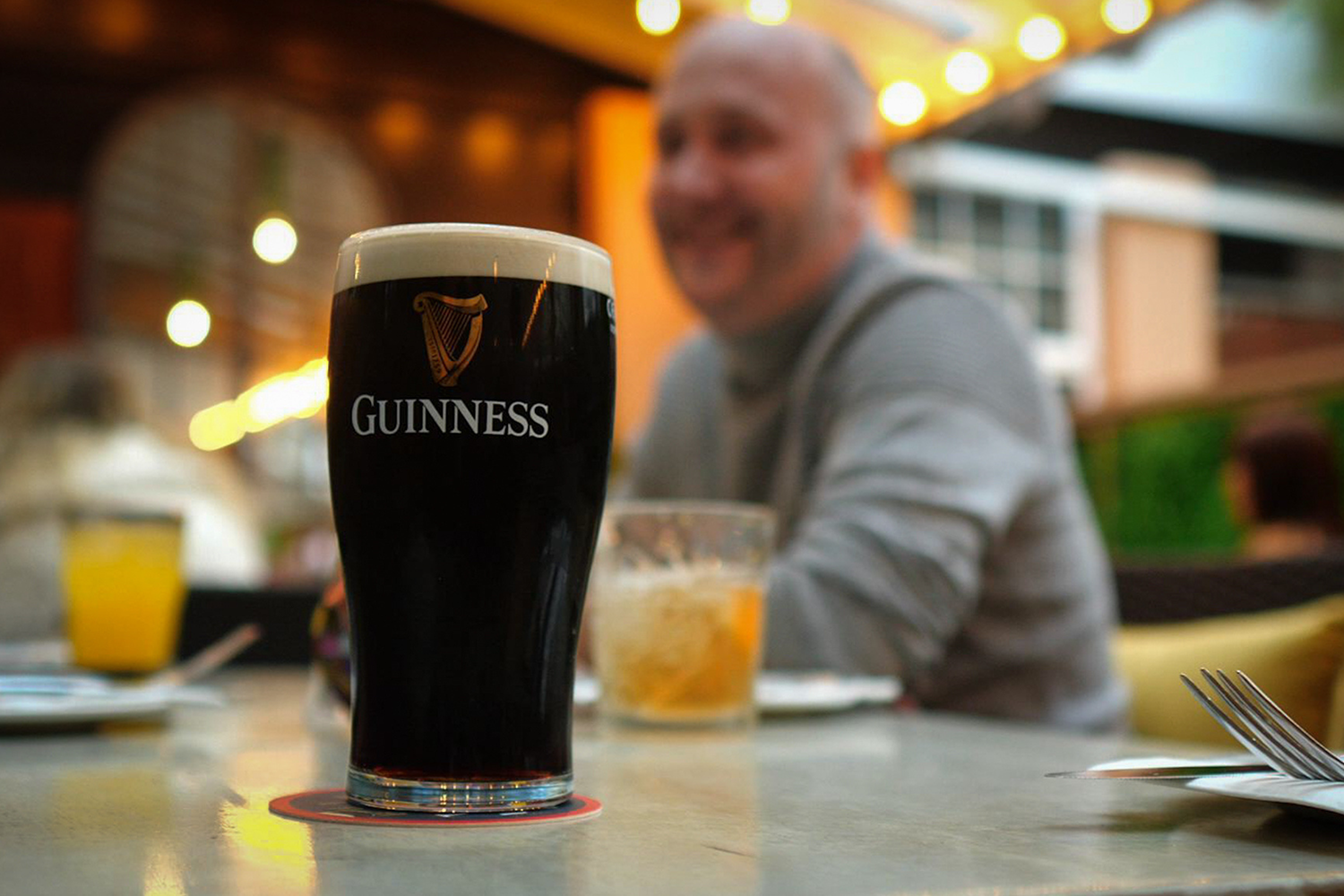 Pint of Guinness on a table, Old Music Shop restaurant in Dublin