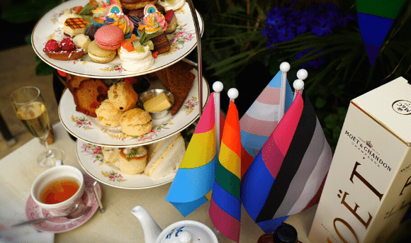 Afternoon Tea served in garden terrace in Dublin City Centre with Pride flags on display