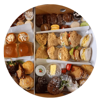Vegetarian and Classic Afternoon Tea Take Away Box full of sandwiches, scones, jam, cream and desserts Old Music Shop Restaurant Dublin