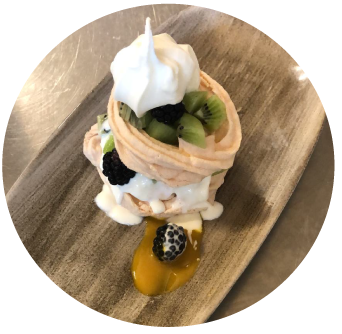 Pavlova with Blackberries and Kiwi and fresh cream