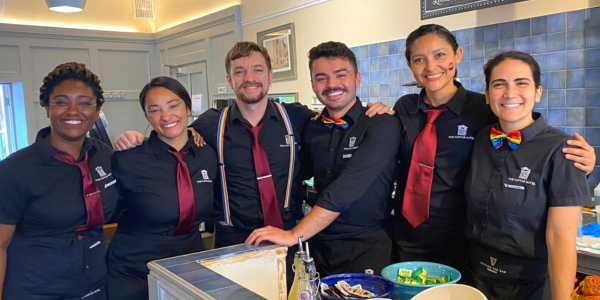 Serving Team smile beside Continental Breakfast service counter