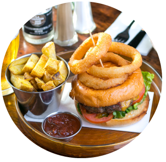Burger with Homemade Chips and Onion Rings at Old Music Shop Restaurant Dublin Ireland