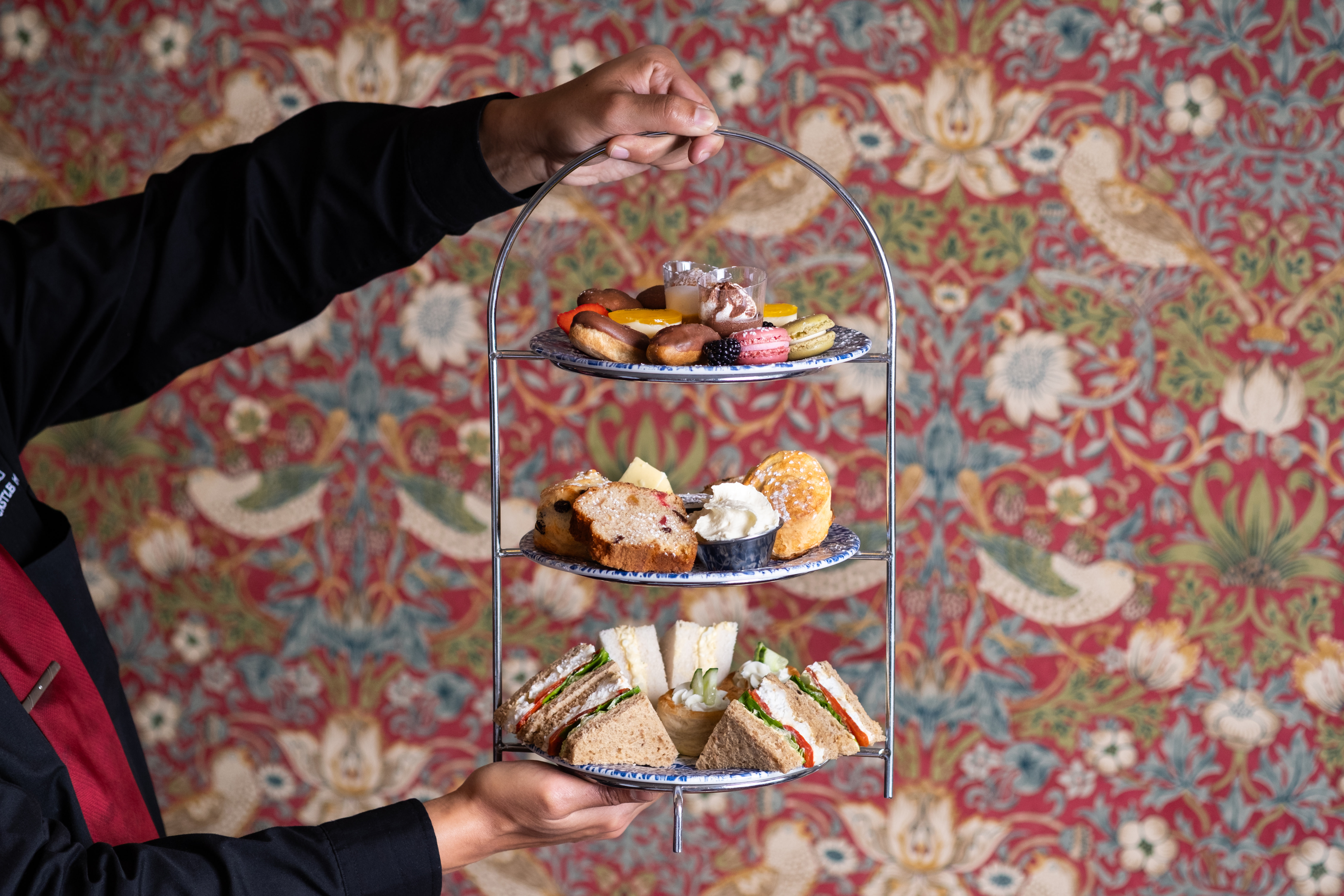 Garden Terrace with tables and chairs and mirror and leafy plants